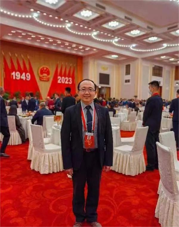 梁克玮、刘品祥代表“两个中心”参加国庆招待会